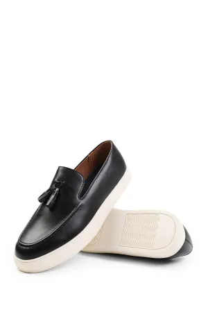 OLIVER SLIP ON TASSEL LOAFERS IN BLACK